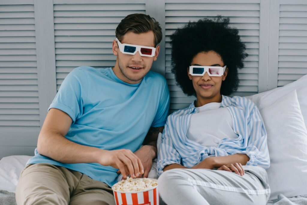 couple-watching-movie-at-home-with-3d-glasses
